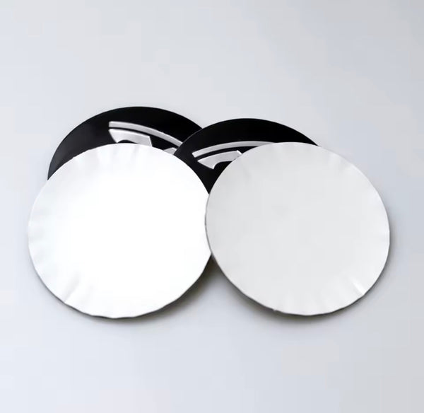 Center stickers with the Tesla logo for rims